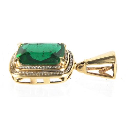 916 - Large 10ct gold green stone and diamond pendant, 3.5cm high, 5.8g