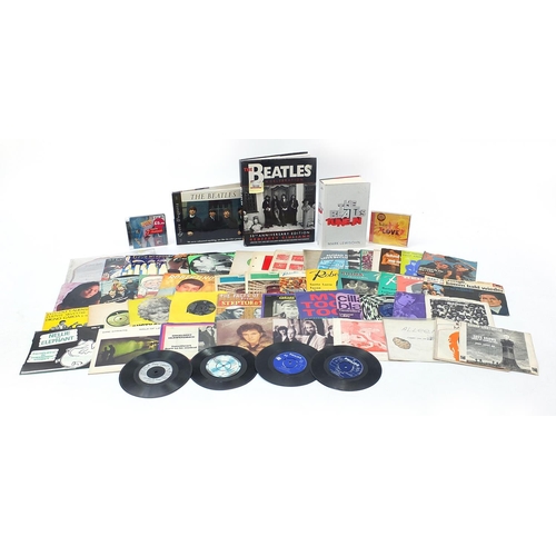 2630 - Vinyl LP's, CD's and related hardback books including The Beatles and Rolling Stones