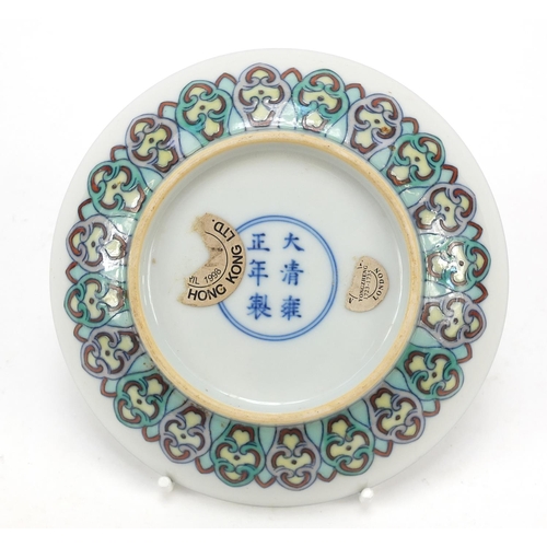 998 - Chinese doucai porcelain dish hand painted with flower heads amongst scrolling foliage, six figure c... 