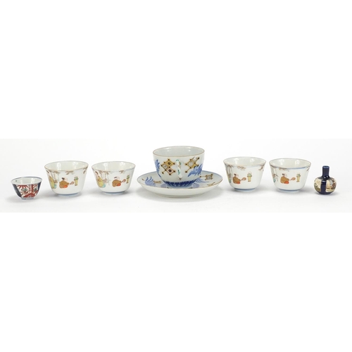 1003 - Japanese ceramics including a cup with saucer hand painted with phoenixes, miniature Satsuma vase an... 