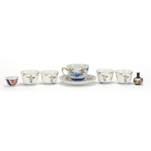 1003 - Japanese ceramics including a cup with saucer hand painted with phoenixes, miniature Satsuma vase an... 