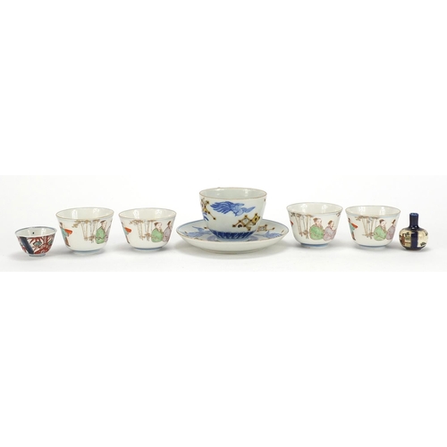 1003 - Japanese ceramics including a cup with saucer hand painted with phoenixes, miniature Satsuma vase an... 