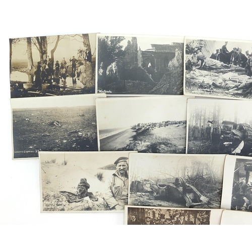 443 - World War I black and white photographic postcards, predominantly German including trenches, dead so... 