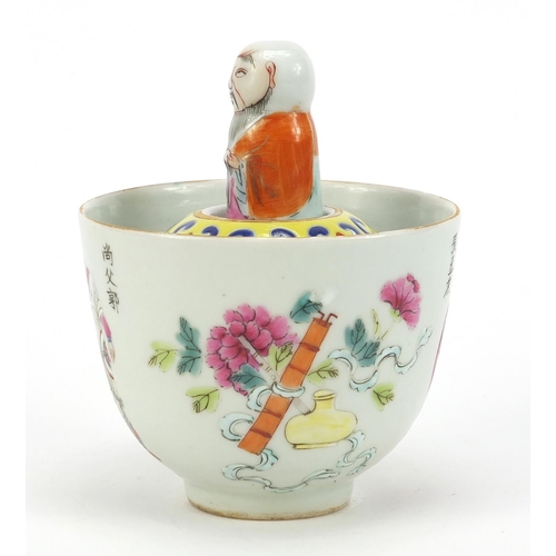 712 - Unusual Chinese porcelain bowl with attached water pot containing a robed figure that rises out of t... 