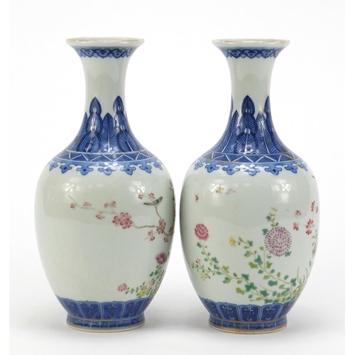 272 - Pair of Chinese blue and white porcelain vases hand painted in the famille rose palette with birds a... 