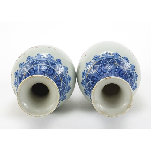 272 - Pair of Chinese blue and white porcelain vases hand painted in the famille rose palette with birds a... 