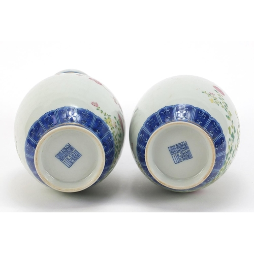 272 - Pair of Chinese blue and white porcelain vases hand painted in the famille rose palette with birds a... 