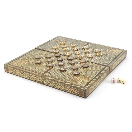 134 - Syrian Moorish design inlaid folding chess/games board with draughts, 40.5cm x 40.5cm