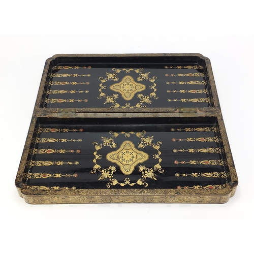 135 - Chinese black lacquered folding chess/games board, finely gilded with figures, flowers and dragons, ... 