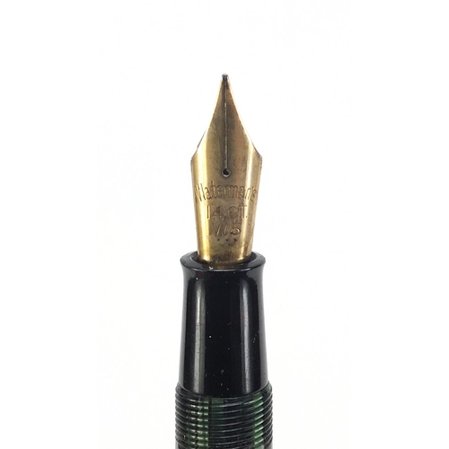 239 - Watermans green marbleised fountain pen and propelling pencil with gold nib and two harmonicas compr... 