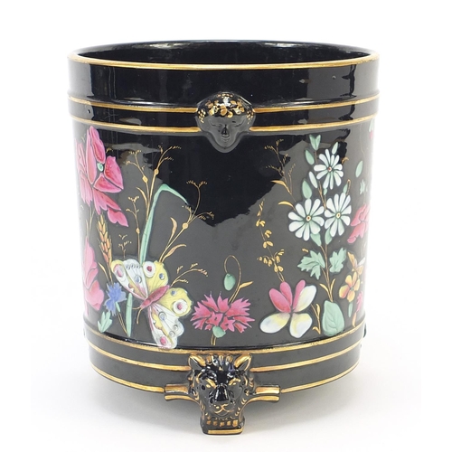 73 - Victorian aesthetic three footed jardinière with masks, enamelled with butterflies amongst flowers, ... 