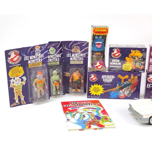 2431 - Vintage and later Ghostbusters toys and collectables with boxes including Ecto-1 vehicle, monsters a... 