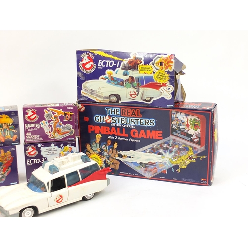 2431 - Vintage and later Ghostbusters toys and collectables with boxes including Ecto-1 vehicle, monsters a... 