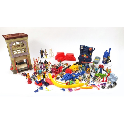 2432 - Large collection of Ghostbusters toys including fire station, vehicles and action figures