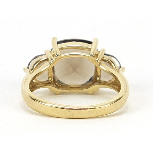 390 - 9ct gold smoky quartz three stone ring, size N, 4.1g