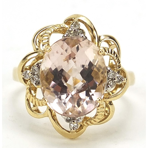 1117 - 9ct gold pink stone and diamond ring with pierced setting, size N, 4.0g