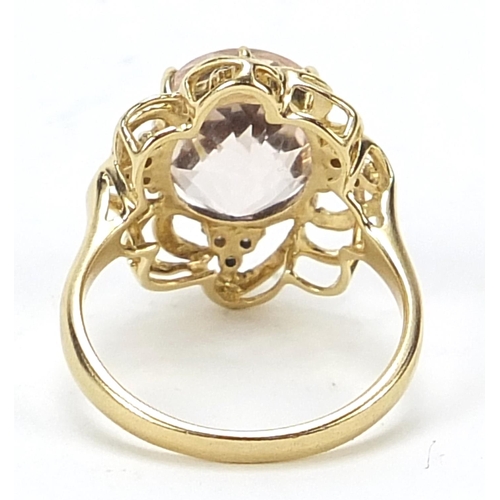 1117 - 9ct gold pink stone and diamond ring with pierced setting, size N, 4.0g