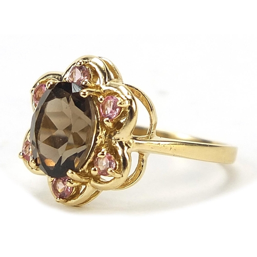 579 - 9ct gold smoky quartz and pink stone ring with pierced setting, size N, 3.0g