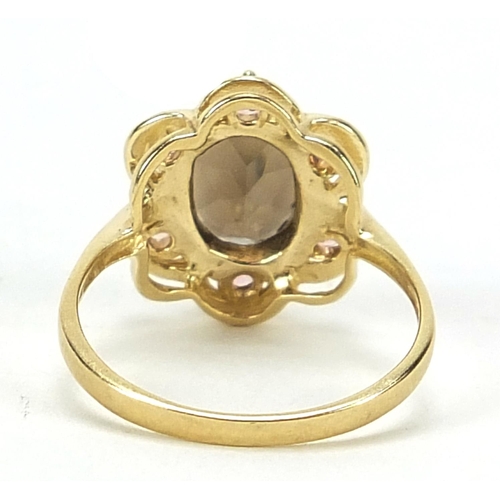 579 - 9ct gold smoky quartz and pink stone ring with pierced setting, size N, 3.0g