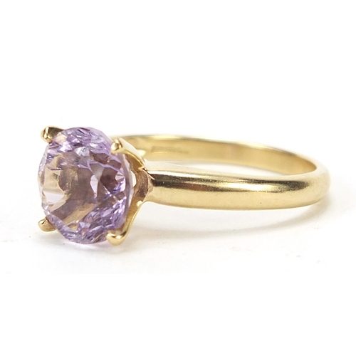 649 - 9ct gold purple stone solitaire ring, size N, 2.8g