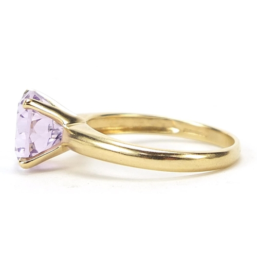 649 - 9ct gold purple stone solitaire ring, size N, 2.8g