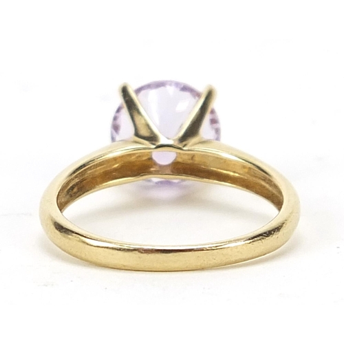 649 - 9ct gold purple stone solitaire ring, size N, 2.8g