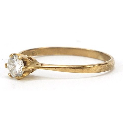 1073 - 9ct gold clear stone solitaire ring, size R, 1.5g