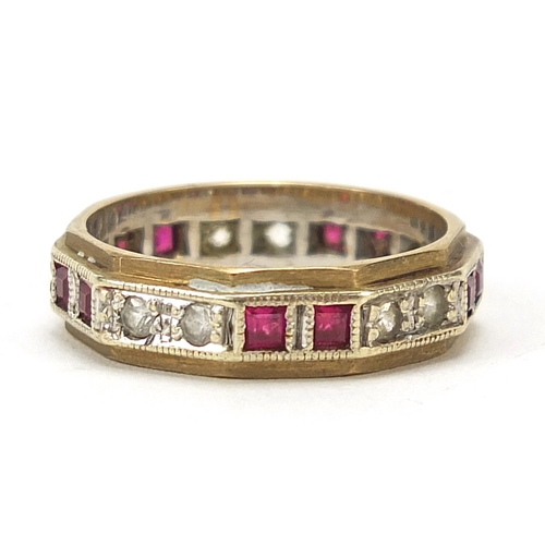 501 - Unmarked gold ruby and white sapphire eternity ring, size N, 3.7g