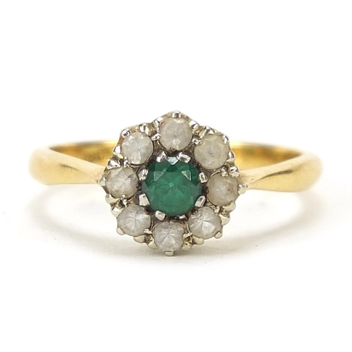 663 - 18ct gold green and clear stone flower head ring, size I/J, 2.6g