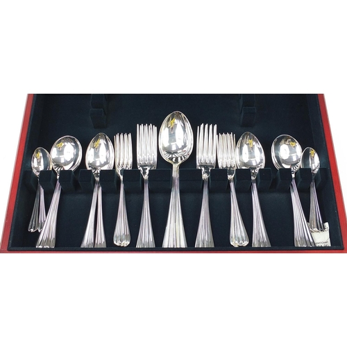 1082 - Arthur Price 44 piece canteen of silver plated cutlery by the Royal Mint commemorating Queen Elizabe... 