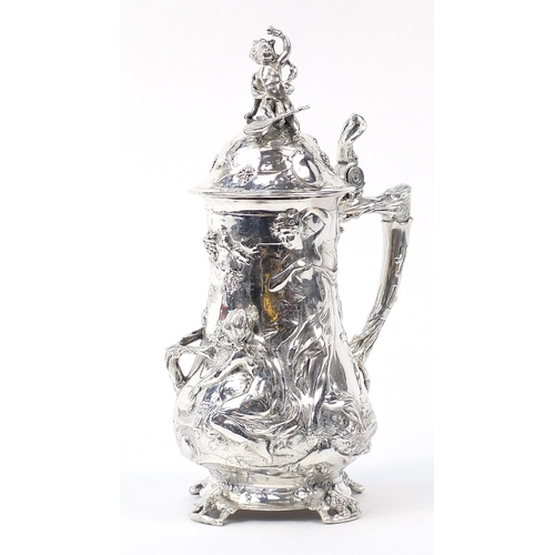 608 - Large classical silver plated stein decorated in relief with a maiden and Putti, 42cm high