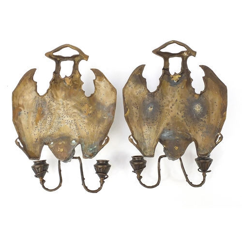 327 - Pair of Art Nouveau design patinated bronze two branch bat design wall sconces, each 36cm high