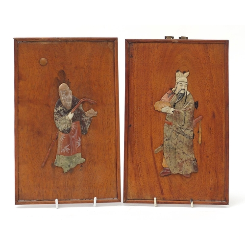 834 - Pair of Chinese hardwood panels with carved soapstone inlay, each depicting an Elder and Emperor hol... 