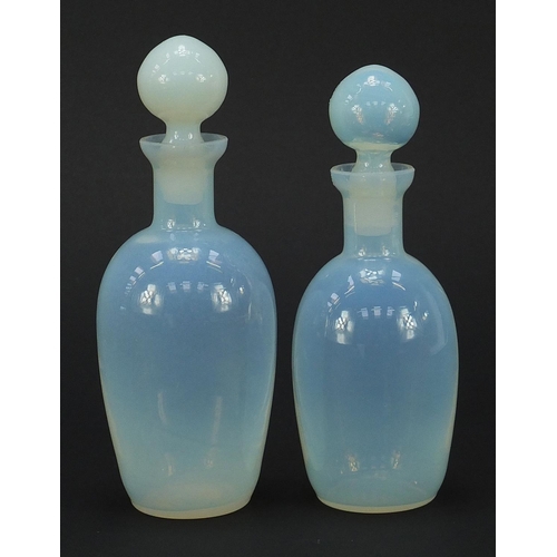 80 - Matched pair of 19th century vaseline glass scent bottles, the largest 18cm high