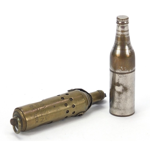 753 - Two military interest trench art lighters including one in the form of a bottle, the largest 7.5cm h... 