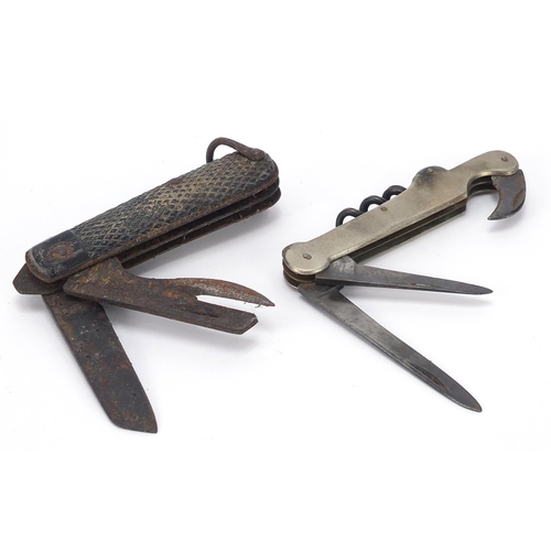 756 - Two military interest folding pocket multi tools including one with corkscrew and Sheffield steel bl... 