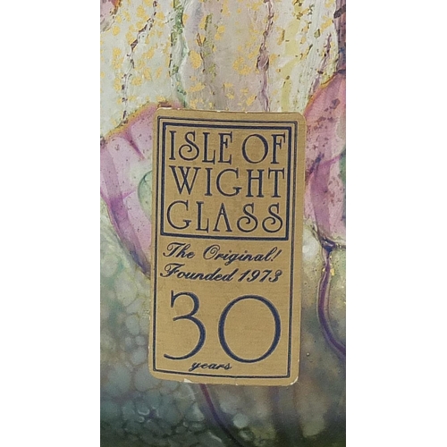 322 - Isle of Wight iridescent glass vase decorated with flowers, 16cm high