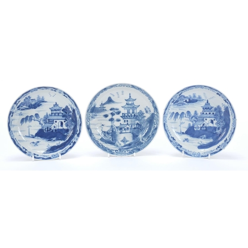 187 - Three Chinese blue and white porcelain dishes each hand painted with a pagoda and river landscape, 1... 