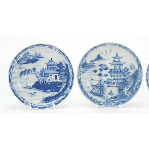 187 - Three Chinese blue and white porcelain dishes each hand painted with a pagoda and river landscape, 1... 