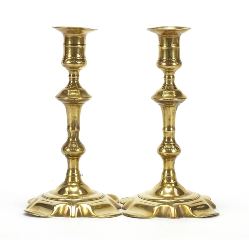 31 - Pair of 18th century brass candlesticks, each 20.5cm high