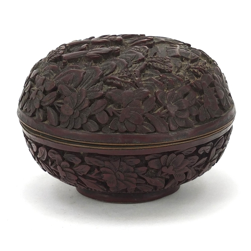 931 - Chinese cinnabar lacquer box and cover carved with two figures in a landscape, 8.5cm in diameter