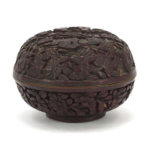 931 - Chinese cinnabar lacquer box and cover carved with two figures in a landscape, 8.5cm in diameter