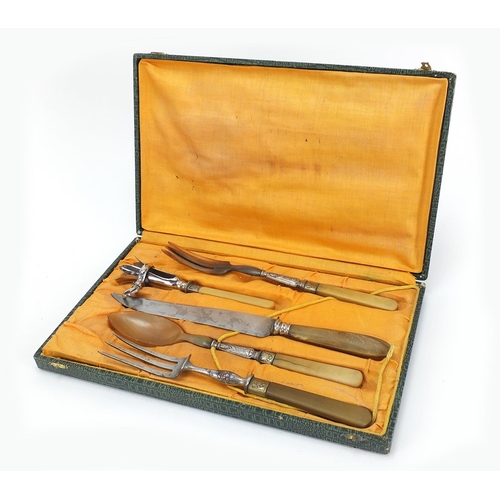 157 - Early 20th century French five piece carving set, with silver plated mounts, some with horn handles/... 