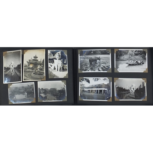 955 - Early 20th century social history black and white photographs housed in an album, some in the Middle... 