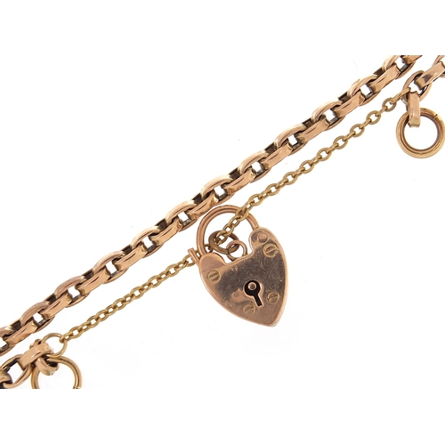 211 - Unmarked gold bracelet, (tests as 9ct gold) with a 9ct gold loveheart padlock, 16cm in length, 7.8g