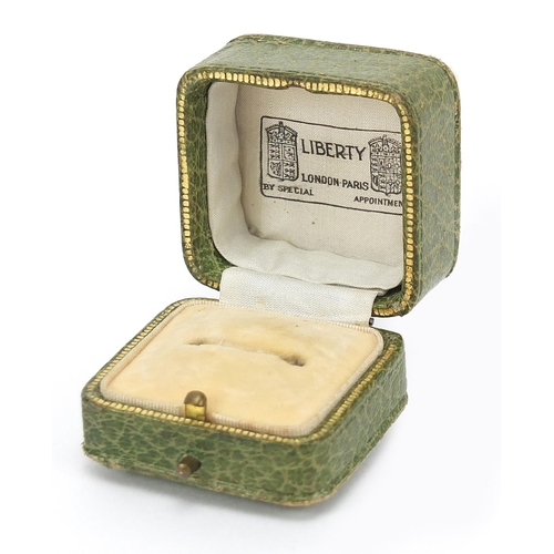 127 - Liberty, tooled green leather ring box with velvet and silk lined interior