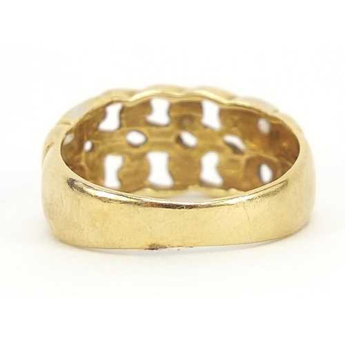 551 - Unmarked gold chain link design ring set with clear stones, (tests as 18ct gold) size O, 3.0g