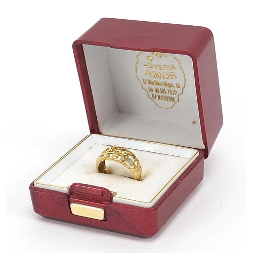 551 - Unmarked gold chain link design ring set with clear stones, (tests as 18ct gold) size O, 3.0g