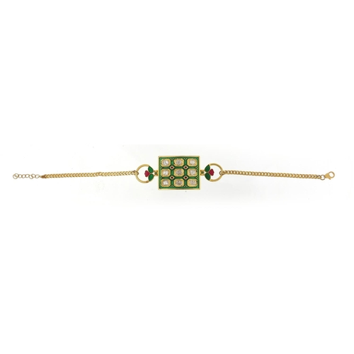 503 - Islamic silver gilt, diamond and enamel bracelet, 18cm in length, 20.8g