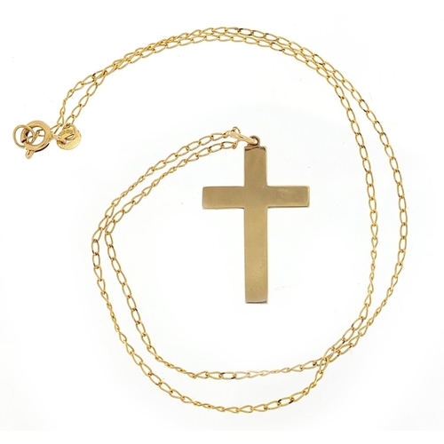 215 - 9ct gold cross pendant on a 9ct gold necklace, 2.8cm high and 44cm in length, total 3.8g